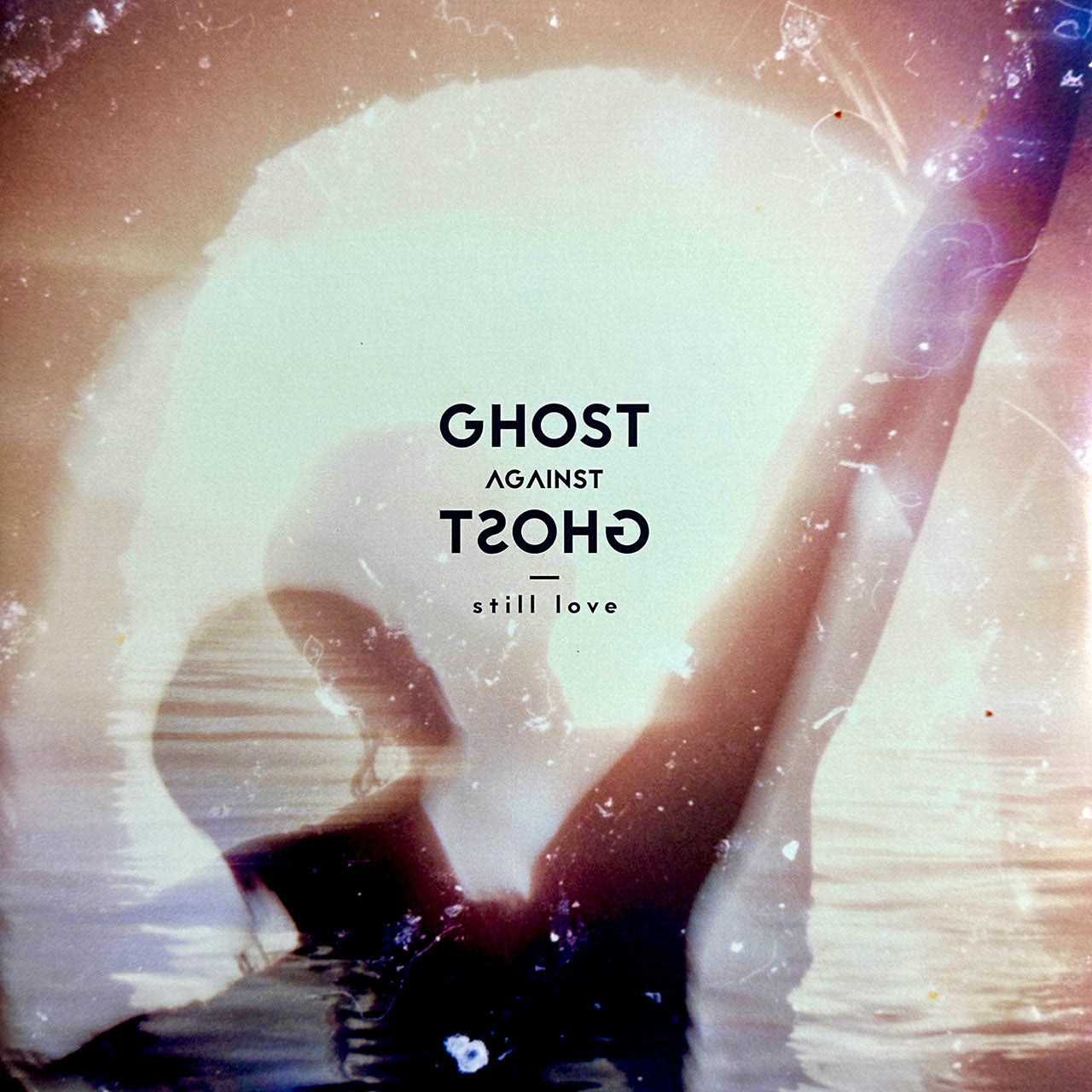 still love (Ghost Against Ghost) album cover — a washed, double-exposure figure with arms raised over water